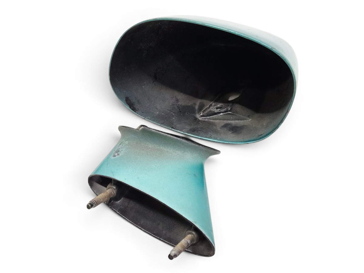 Send it Auto Parts OEM GM teal rear view mirror housings for 1978-1982 Corvette C3, showing paint wear.