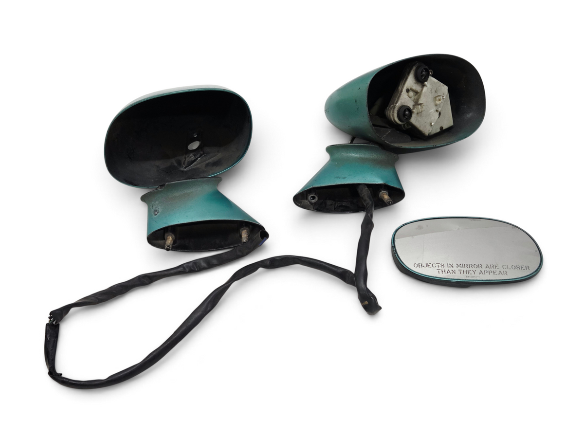 Send it Auto Parts OEM GM rear view mirrors for 1978-1982 Corvette C3 in teal green, including wiring and glass.