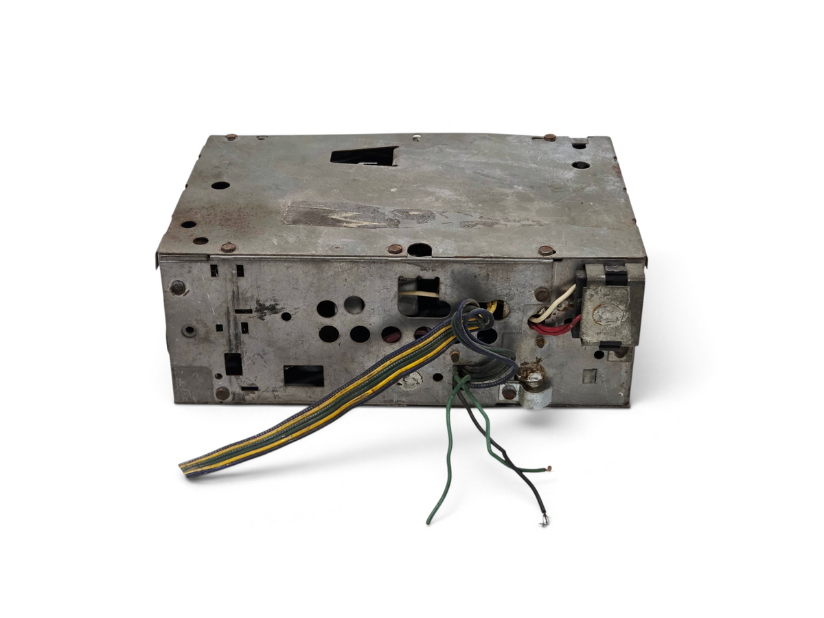 Send it Auto Parts OEM GM 1972-1976 Corvette C3 AM FM radio unit showing rear wiring and metal casing