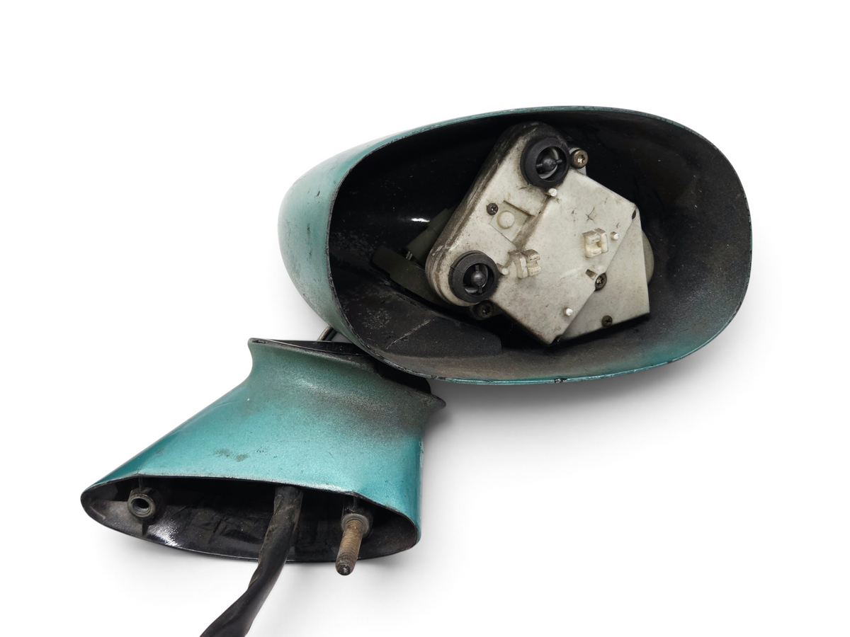 Send it Auto Parts OEM GM Corvette C3 rear view mirror housing in teal paint, showing internal adjustment mechanism.