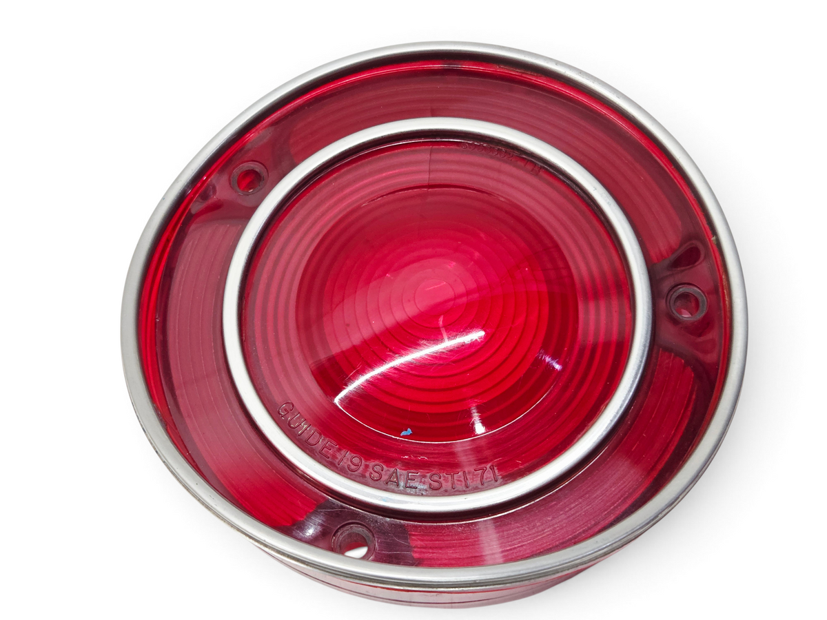 Send it Auto Parts OEM red tail light lens for 1971-1973 Corvette C3 with chrome trim ring