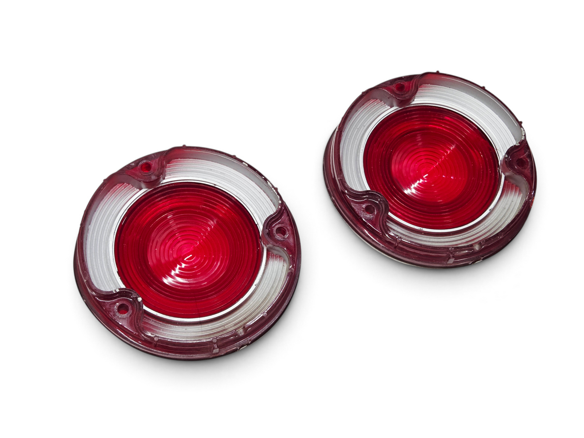 Send it Auto Parts OEM red and clear tail light lenses for 1971-1973 Corvette C3, free of cracks or blemishes.