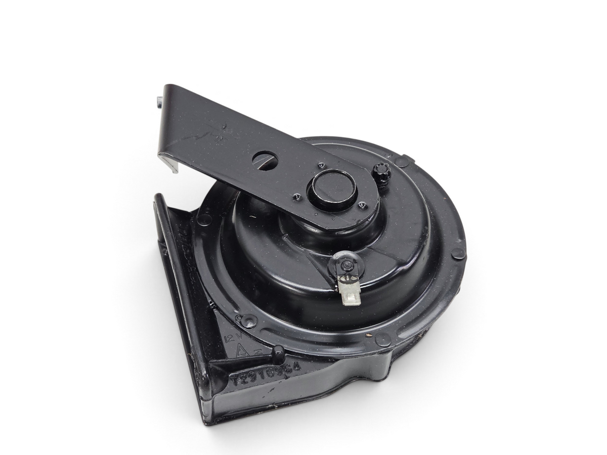 Send it Auto Parts OEM GM 1984-1986 Corvette C4 horn with black metal housing and mounting bracket