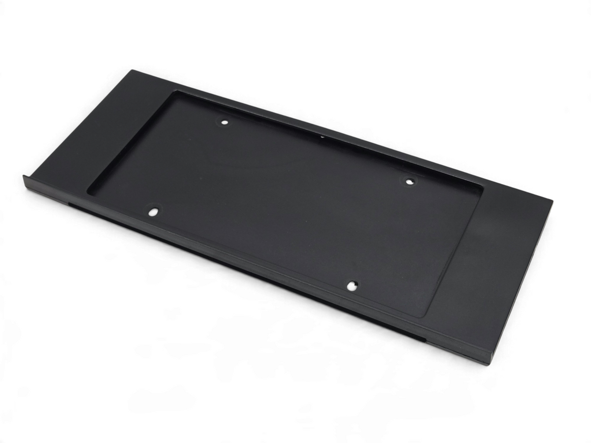 Send it Auto Parts OEM black rear license plate holder for 1990-1995 Corvette C4 ZR-1 in excellent condition