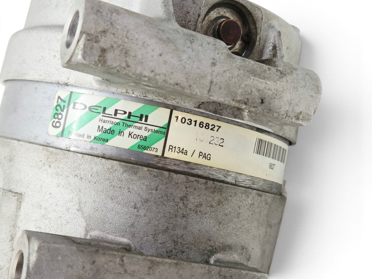 Send it Auto Parts OEM GM Delphi AC compressor for 1997-2004 Corvette C5 showing part number 10316827 label