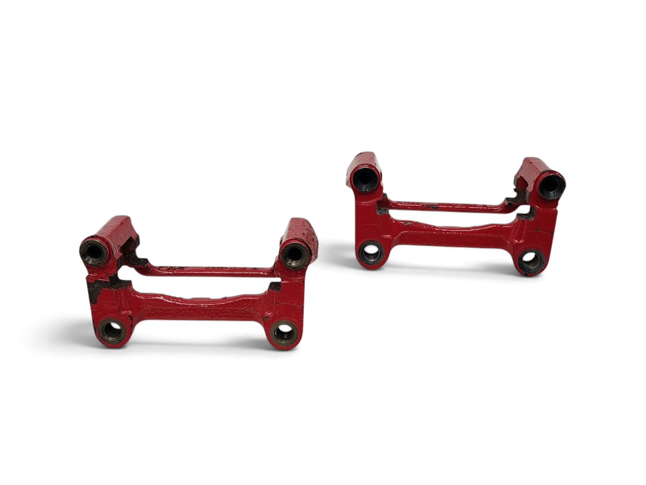 Send it Auto Parts OEM GM rear brake caliper brackets for 2001-2004 Corvette C5 with red painted finish