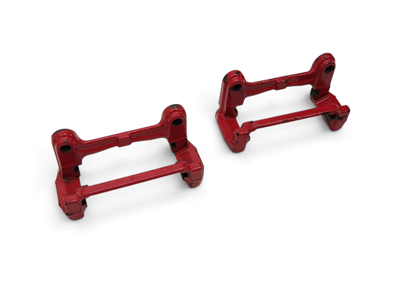 Send it Auto Parts OEM GM rear brake caliper brackets for 2001-2004 Corvette C5, featuring red painted finish.