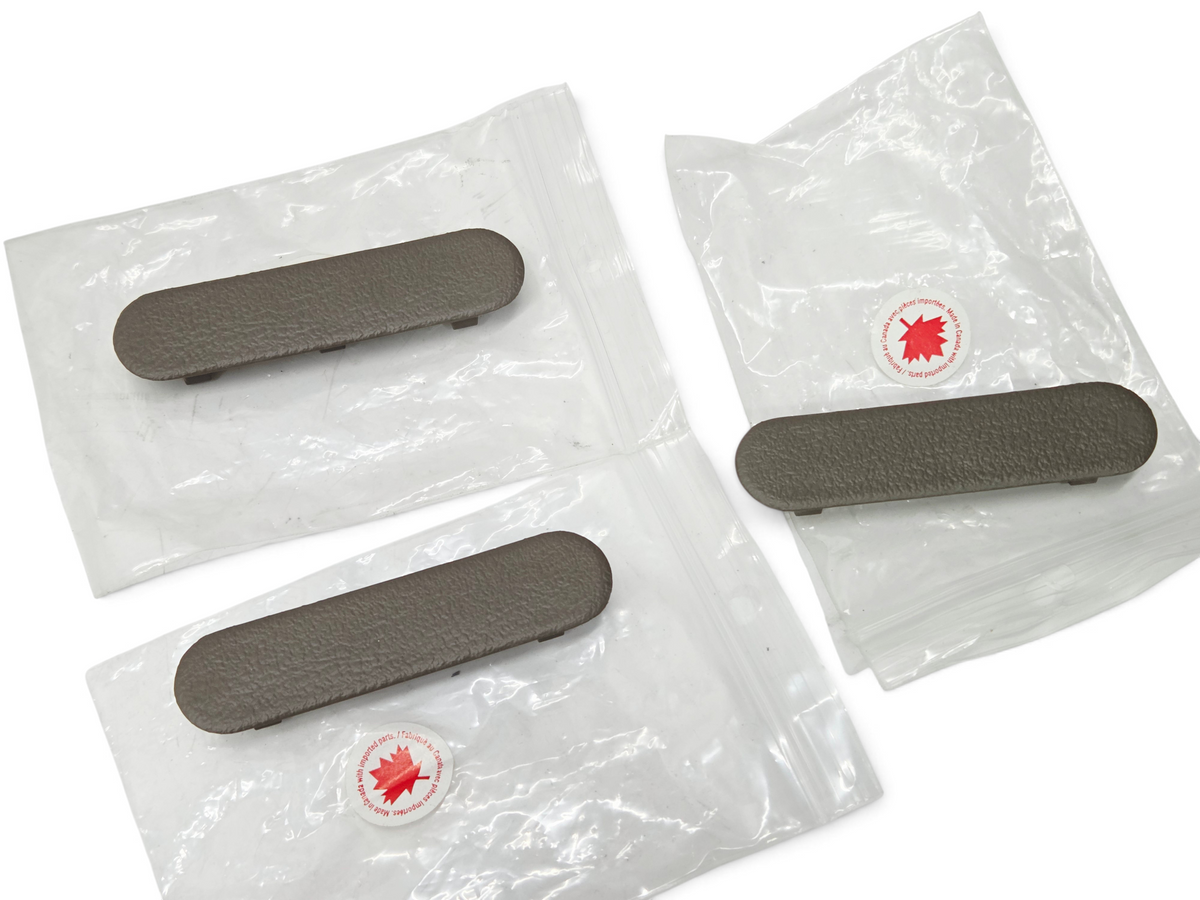 Send it Auto Parts OEM neutral shale door panel plugs for 2003-2004 Corvette C5, set of three in plastic bags.
