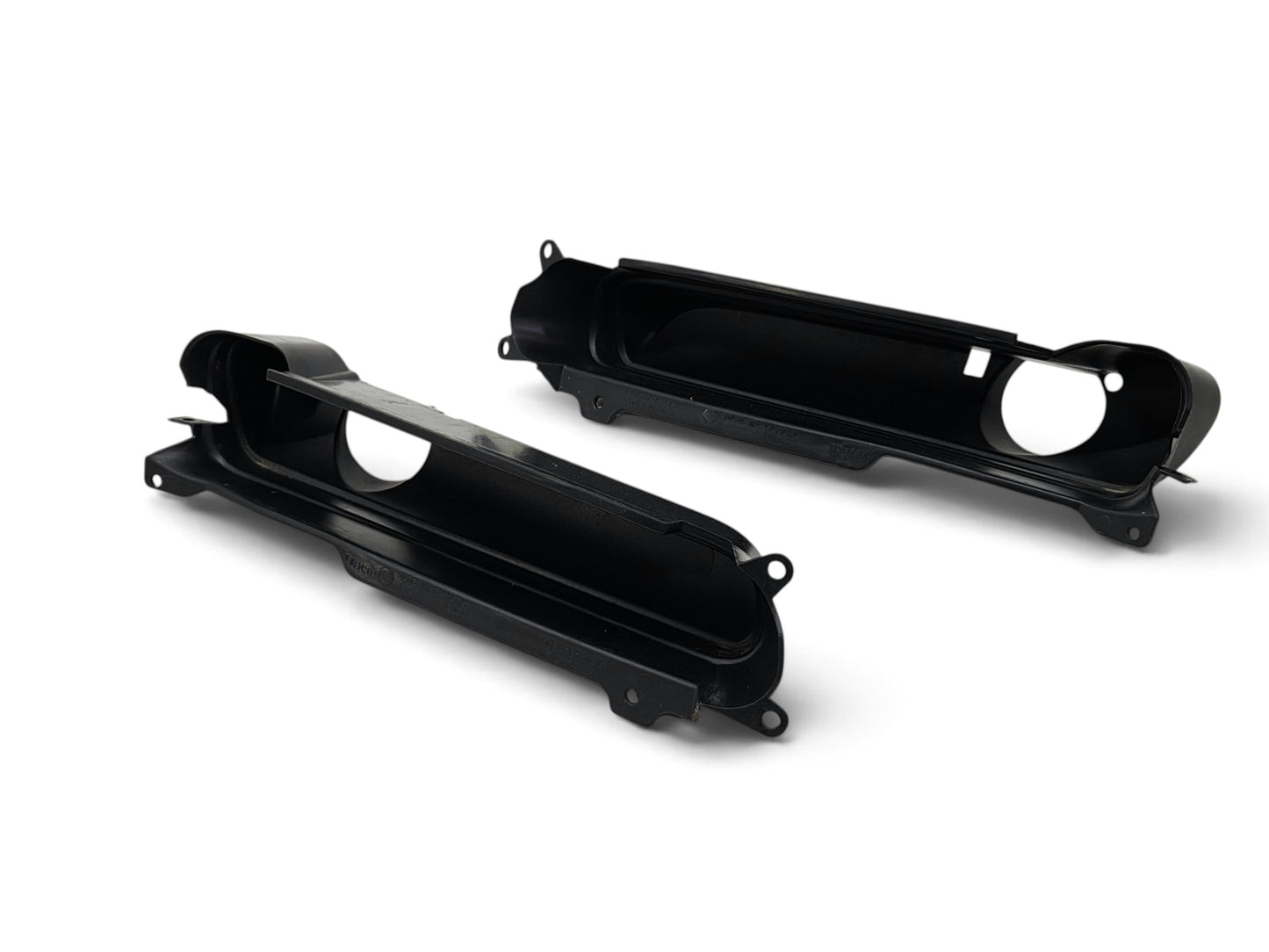 Send it Auto Parts OEM black plastic fog light trim bezels for 1997-2004 Chevrolet Corvette C5