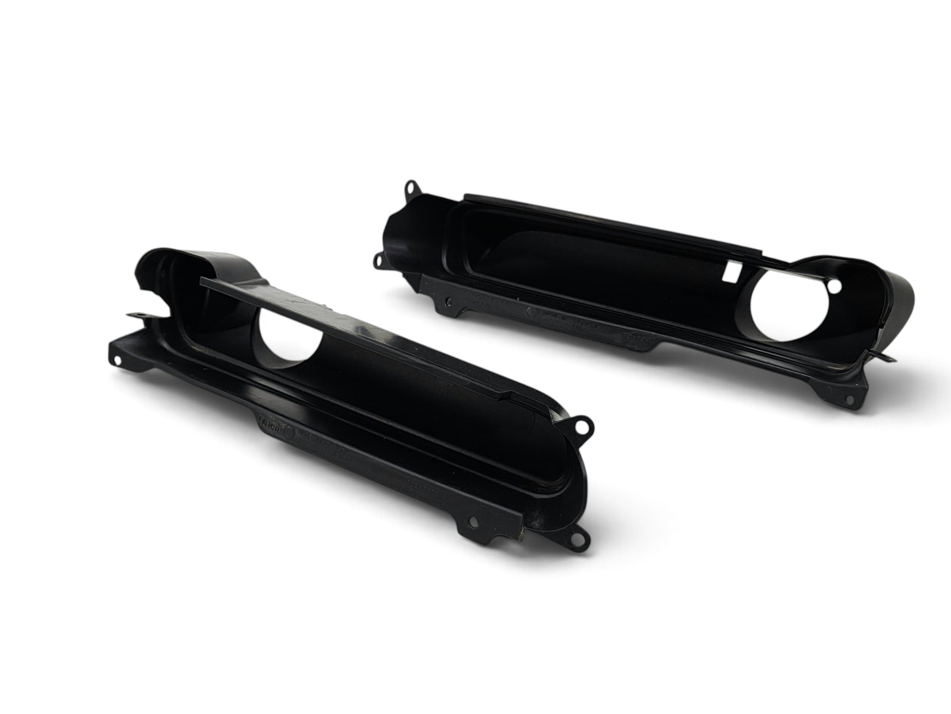 Send it Auto Parts OEM black plastic fog light trim bezels for 1997-2004 Chevrolet Corvette C5