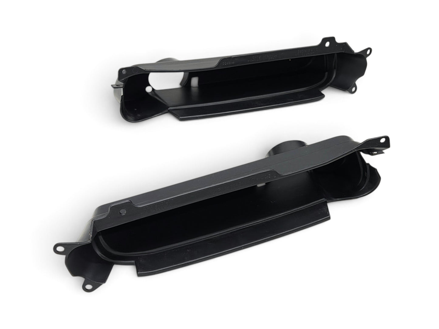 Send it Auto Parts OEM black plastic fog light trim bezels for 1997-2004 Chevrolet Corvette C5