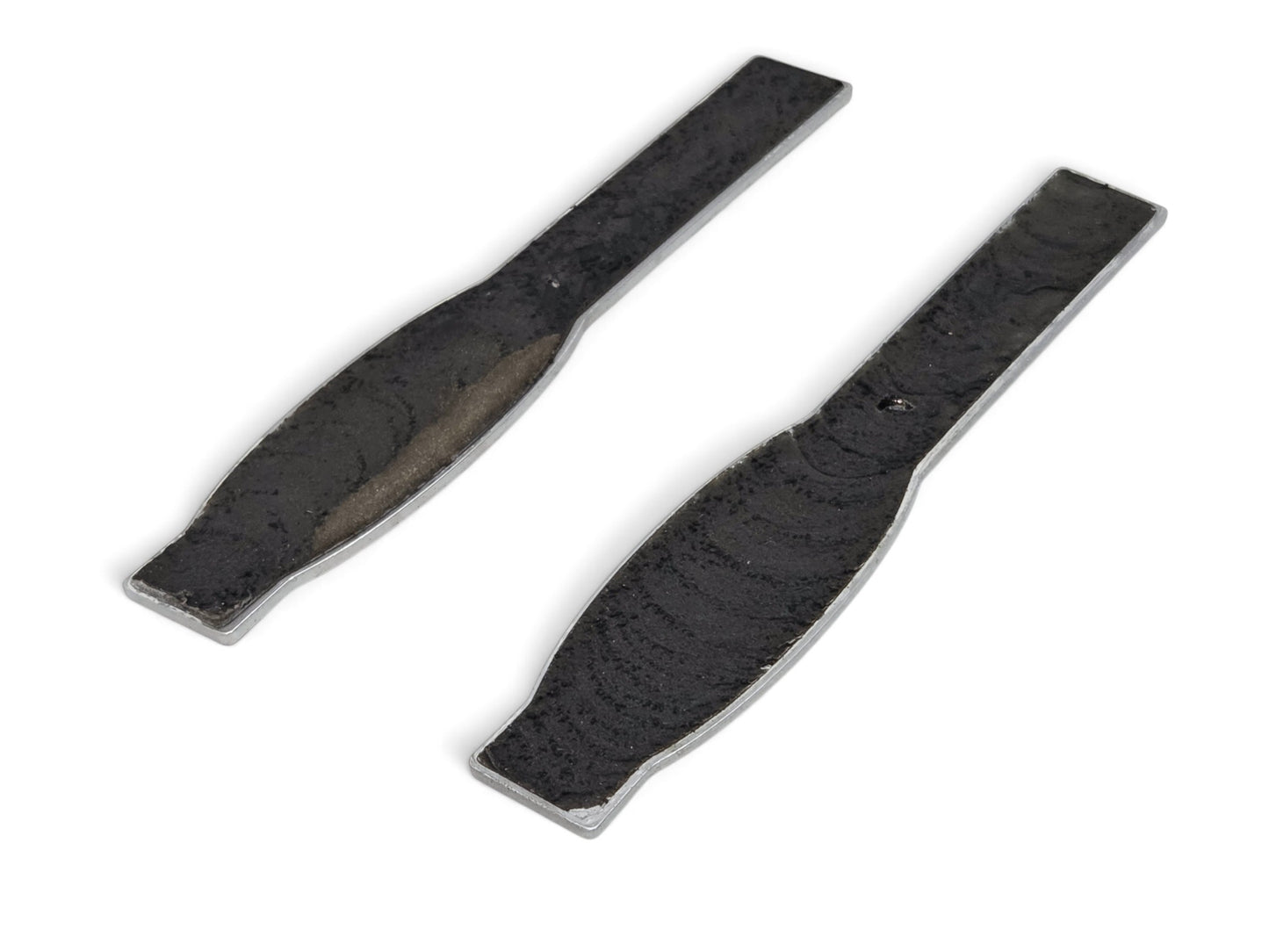 Send it Auto Parts OEM GM fender emblems for 2002-2004 Chevy Corvette C5 Z06 showing the adhesive backing side