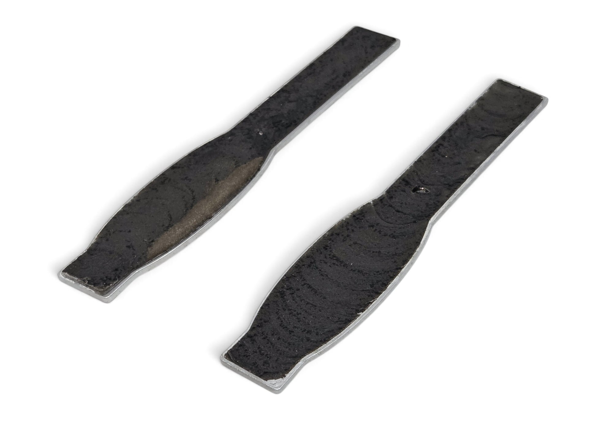 Send it Auto Parts OEM GM fender emblems for 2002-2004 Chevy Corvette C5 Z06 showing the adhesive backing side