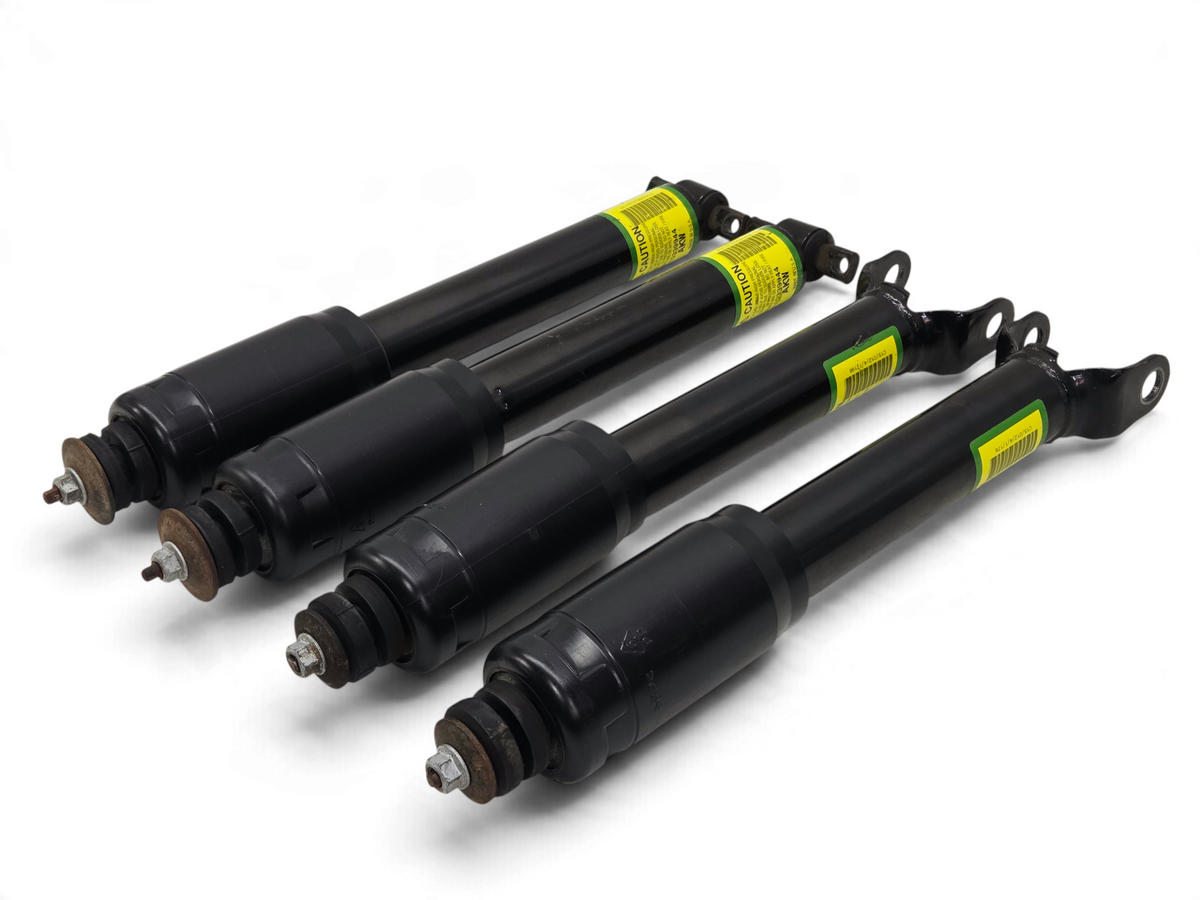 Send it Auto Parts OEM black front and rear shocks for 2004 Corvette C5 Z06 with yellow caution labels