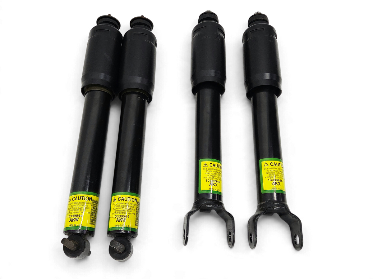 Send it Auto Parts OEM GM front and rear shock absorbers for 2004 Corvette C5 Z06 with yellow caution labels