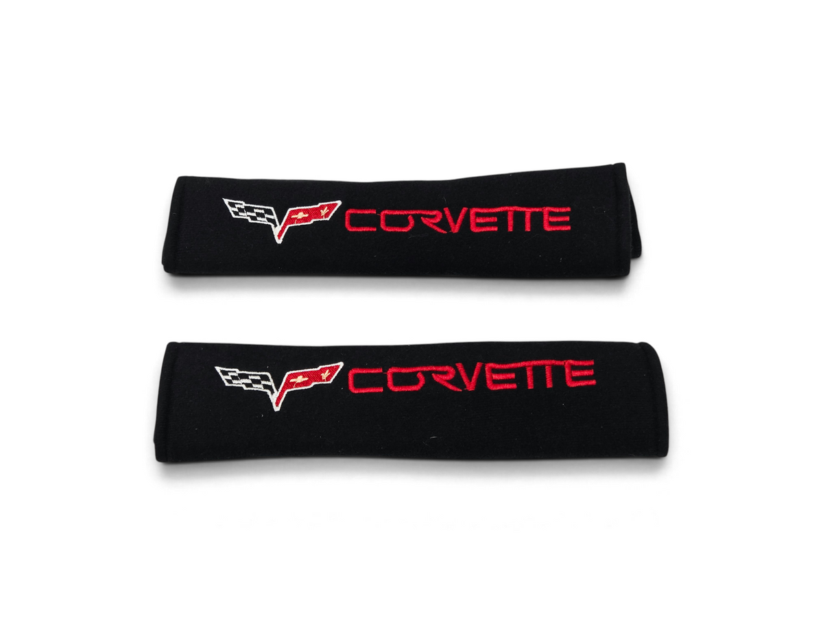 Send it Auto Parts black seat belt pads with red and white embroidered Corvette C6 logos for 2005-2013 models