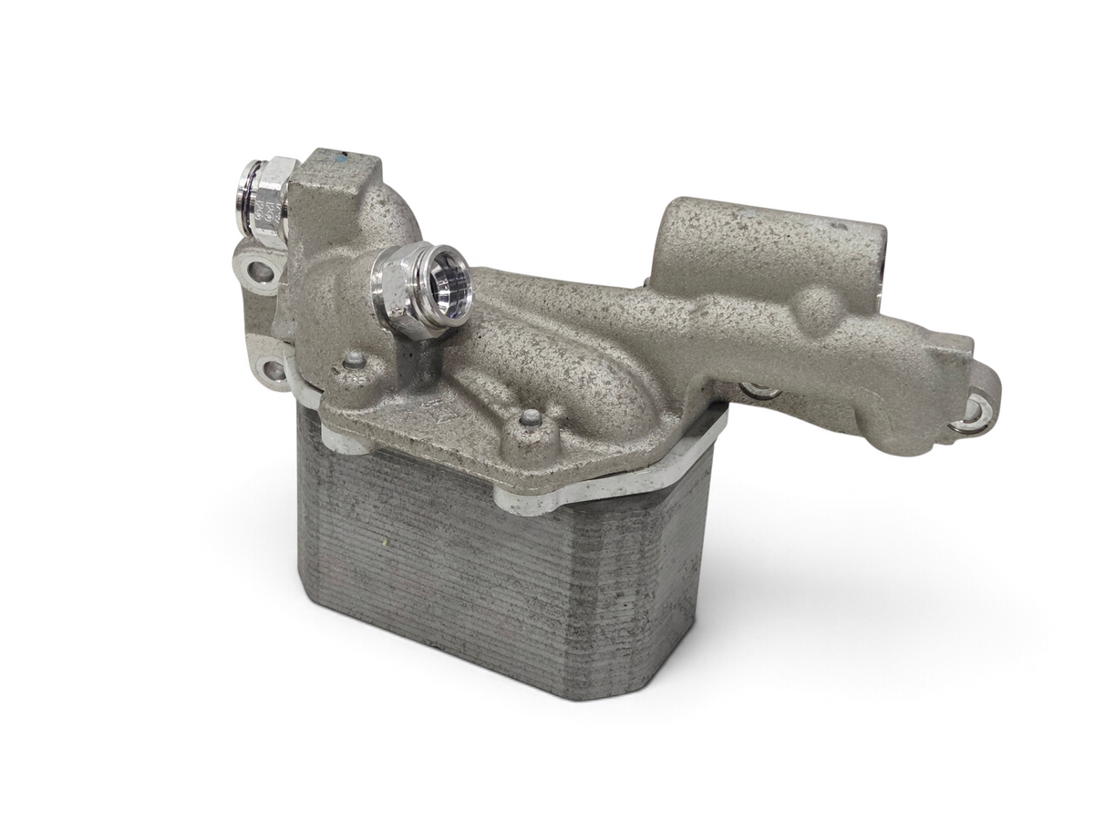 Send it Auto Parts OEM GM Corvette C7 Z06 LT4 dry sump engine oil cooler, showing metal housing and fittings.