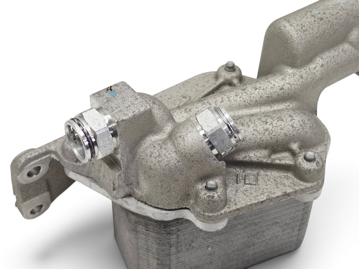 Send it Auto Parts OEM GM Corvette C7 Z06 LT4 dry sump engine oil cooler with metal housing and fittings.