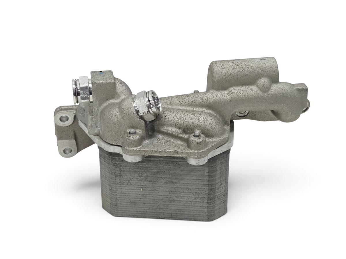 Send it Auto Parts OEM GM Corvette C7 Z06 LT4 dry sump engine oil cooler assembly in silver metal finish.