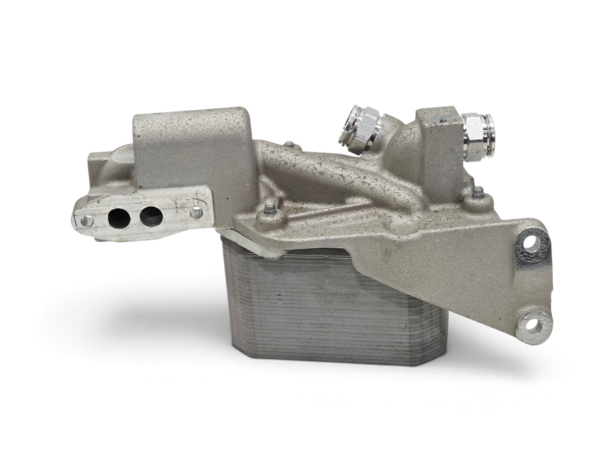 Send it Auto Parts OEM GM engine oil cooler for 2015-2019 Corvette C7 Z06 LT4, featuring a durable metal housing.