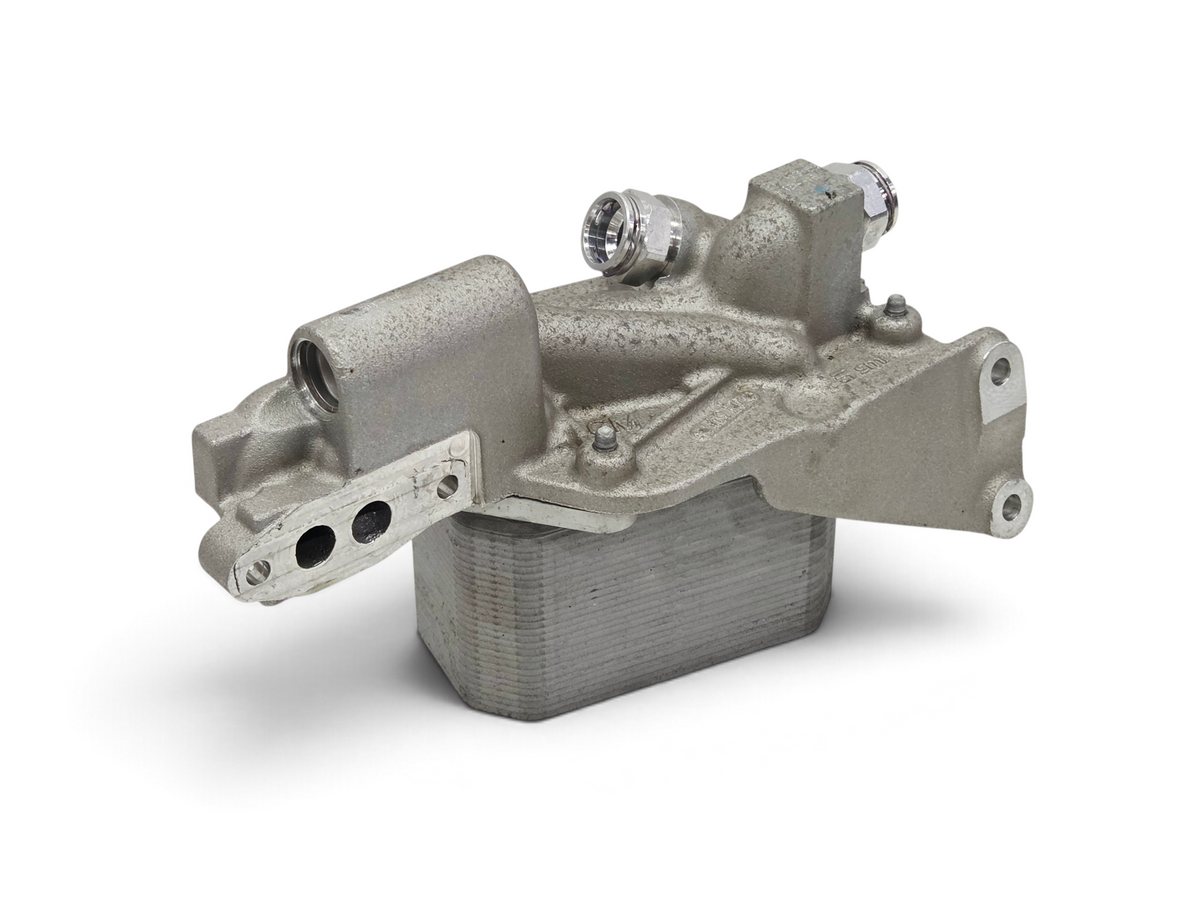 Send it Auto Parts OEM GM engine oil cooler for 2015-2019 Corvette C7 Z06 LT4, showing metal housing and fittings.