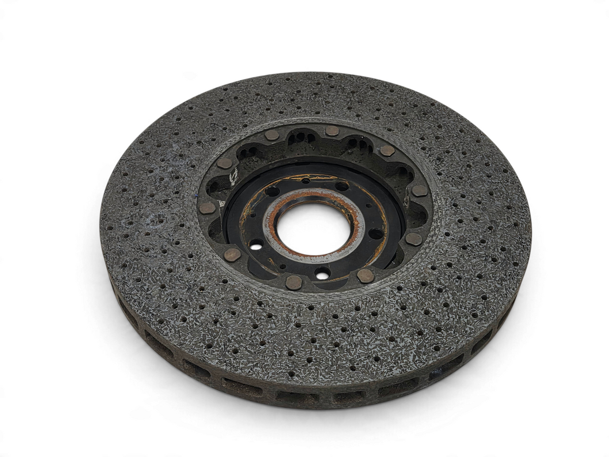 Send it Auto Parts used carbon ceramic front brake rotor for Chevrolet Corvette C7 Z06, showing wear and texture.