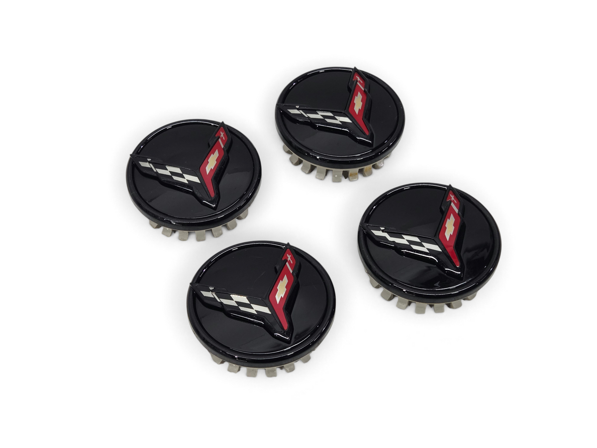 Send it Auto Parts set of four genuine OEM gloss black Corvette C8 Stingray wheel center caps with logo