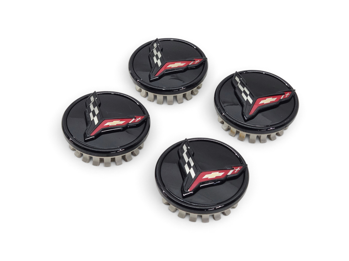 Set of four Send it Auto Parts gloss black OEM Corvette C8 Stingray wheel center caps with red and white emblem