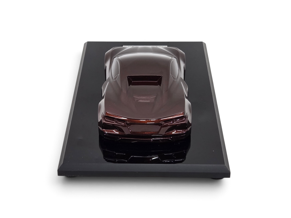 Send it Auto Parts 2022 Corvette C8 Stingray Caffeine speedshape model on a black display base, rear view.