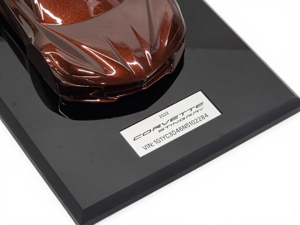 Send it Auto Parts 2022 Corvette C8 Stingray speedshape model in Caffeine metallic brown on a black display base