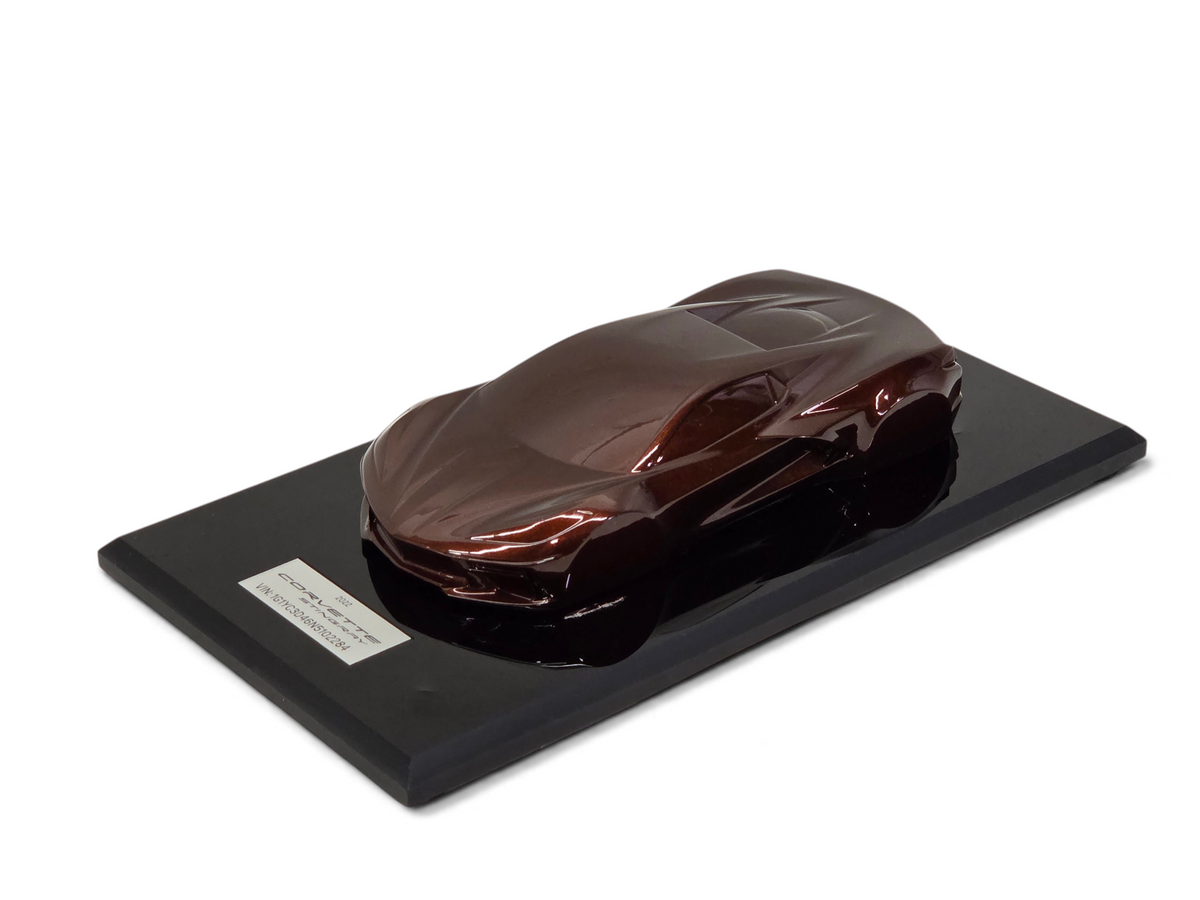 Send it Auto Parts 2022 Corvette C8 Stingray Caffeine speedshape model on a black display base