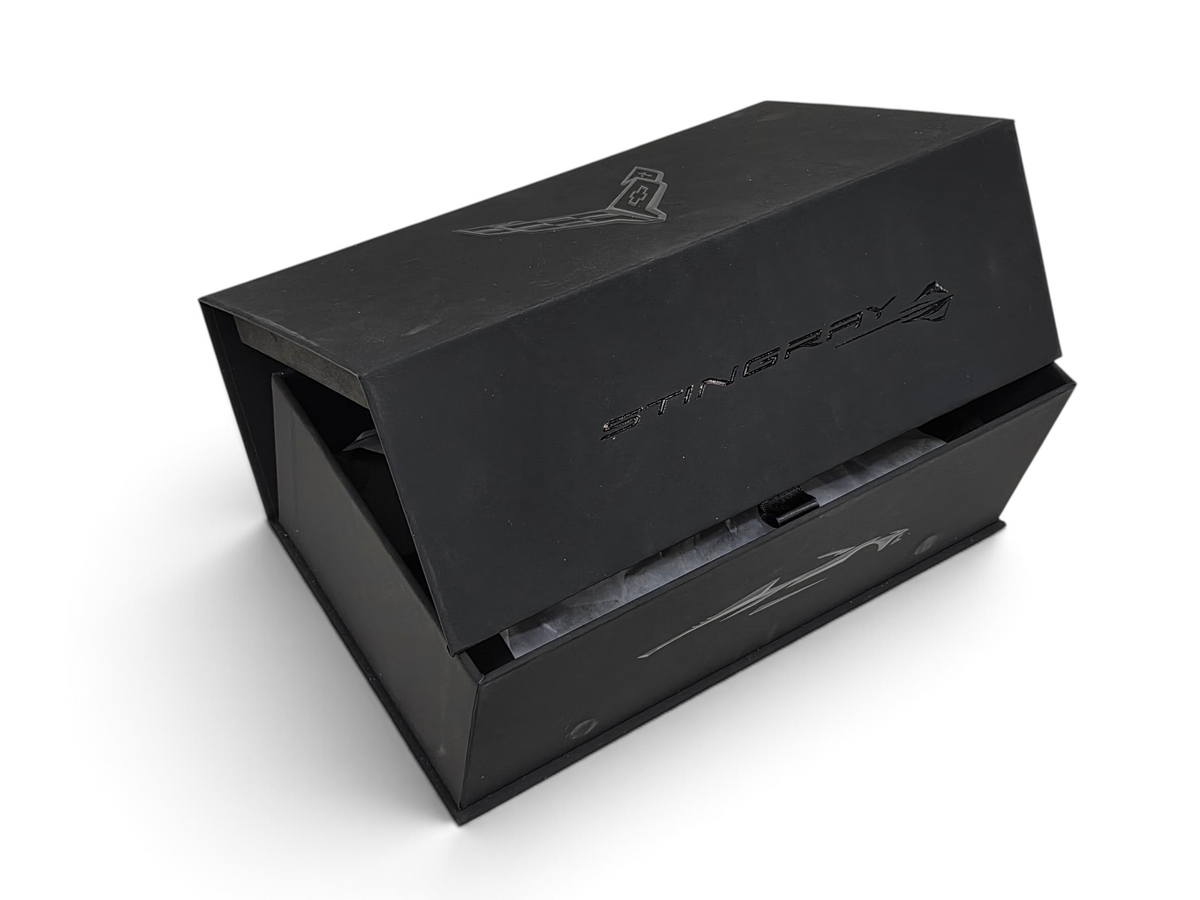 Send it Auto Parts 2025 Corvette C8 Stingray Hysteria Purple speedshape model in a black branded presentation box