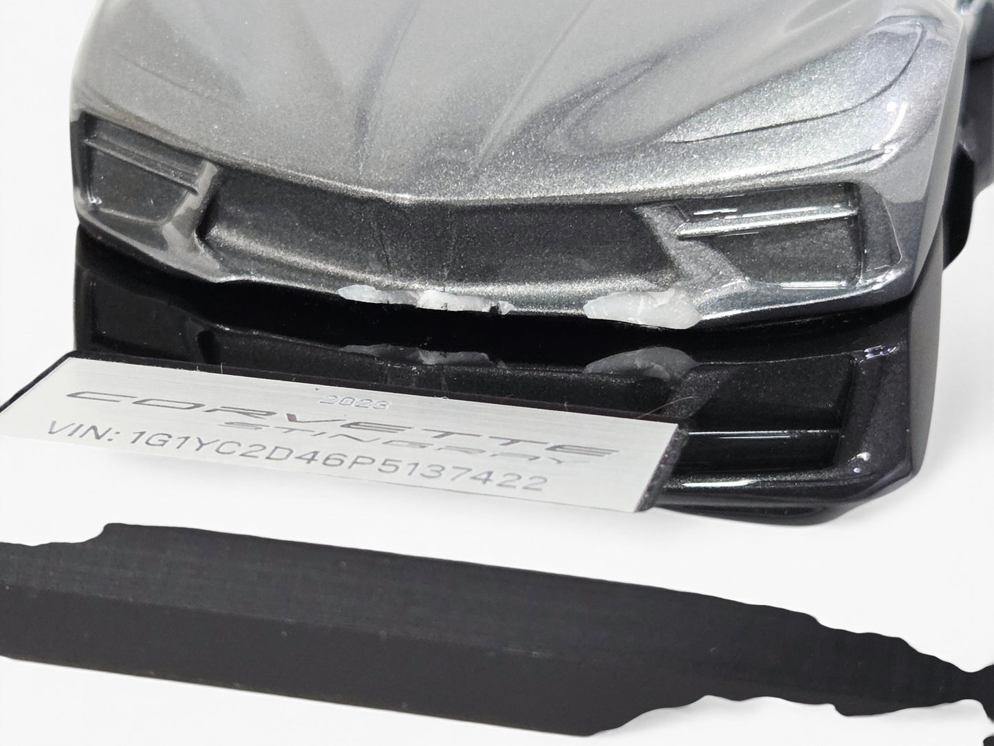 Send it Auto Parts 1:18 scale 2023 Corvette C8 speedshape model in Hypersonic Gray with front air dam damage