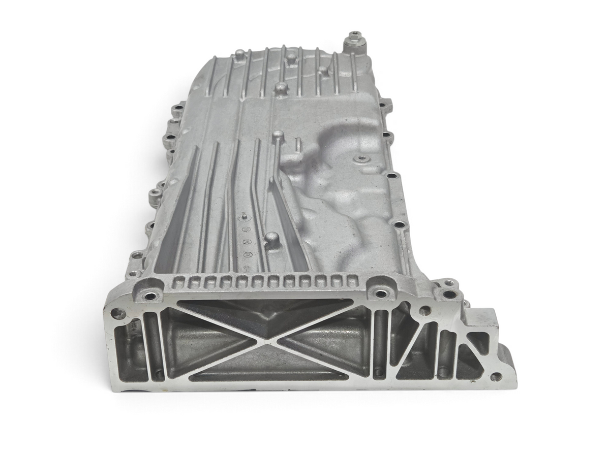 Send it Auto Parts OEM Chevy Corvette C8 6.2L LT2 engine oil pan with baffle, silver cast aluminum construction.
