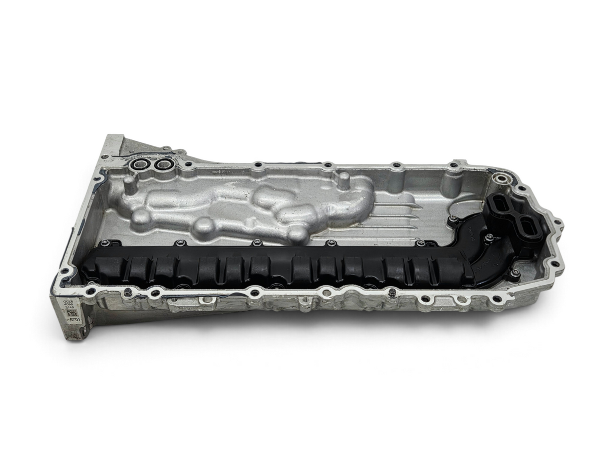Send it Auto Parts OEM Chevy Corvette C8 6.2L engine oil pan with black plastic baffle, silver cast aluminum finish.