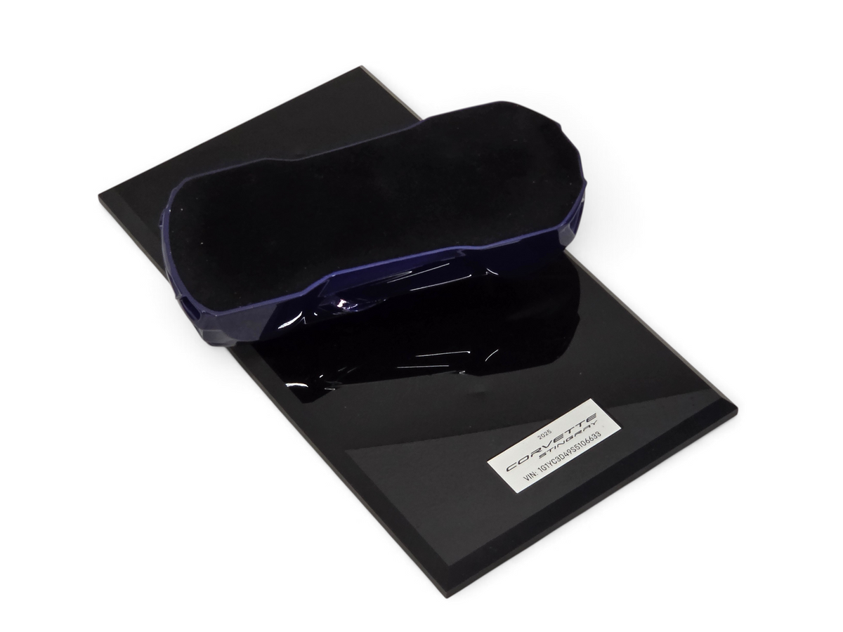 Send it Auto Parts 2025 Corvette C8 Stingray speedshape model in Hysteria Purple on a black display base