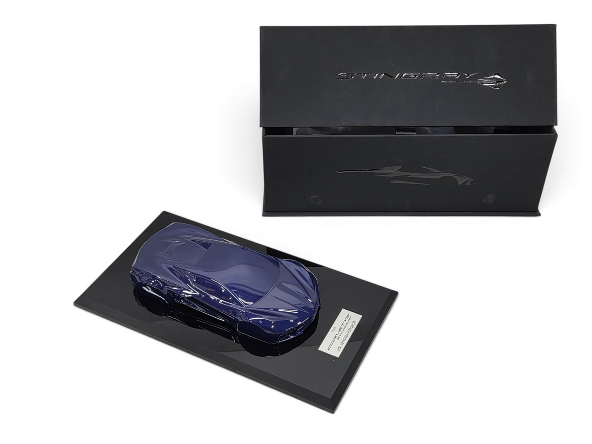 Send it Auto Parts 2025 Corvette C8 Stingray Hysteria Purple 1:18 scale speedshape model on a black display base