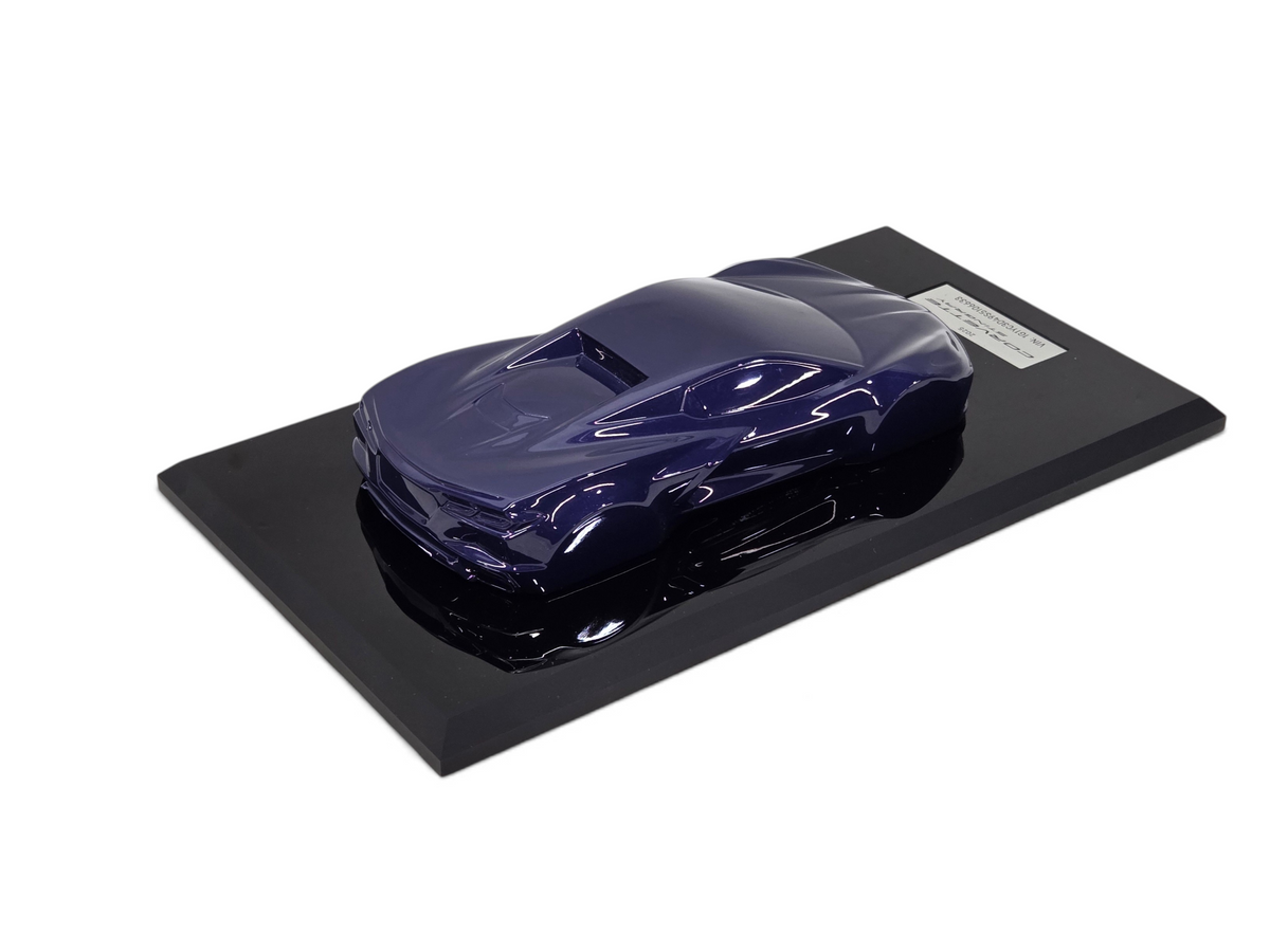 Send it Auto Parts 2025 Corvette C8 Stingray speedshape model in Hysteria Purple on a black display base