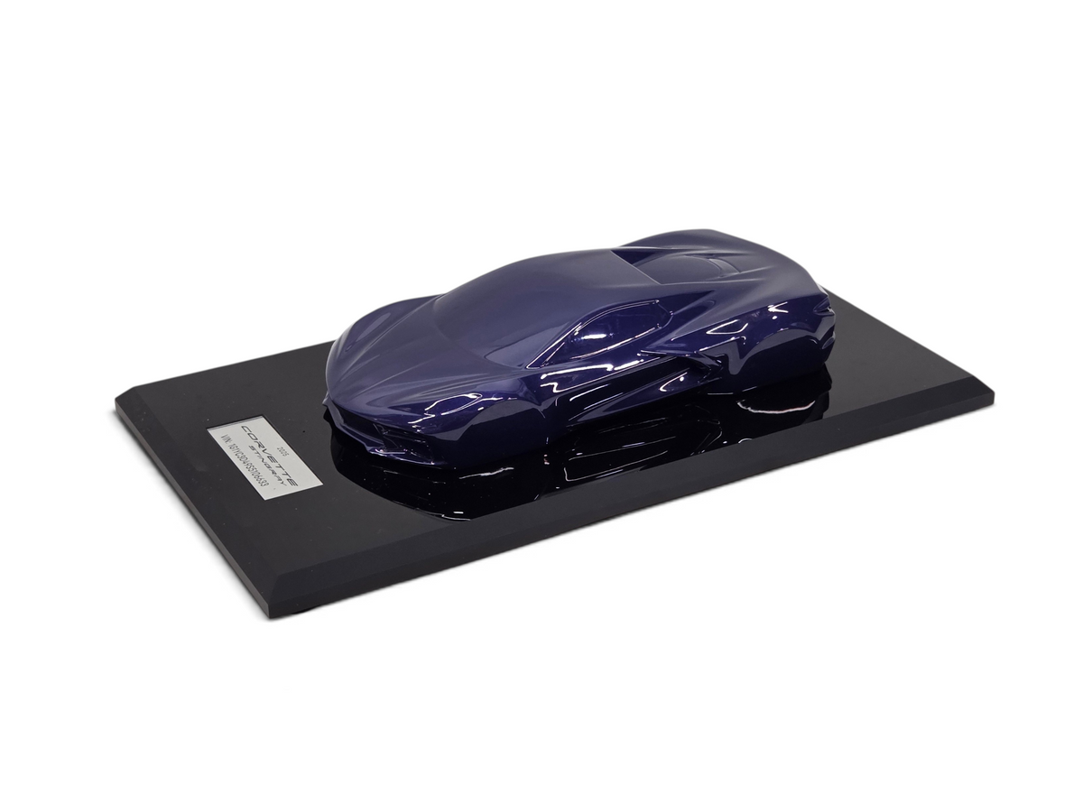 Send it Auto Parts 2025 Corvette C8 Stingray speedshape model in Hysteria Purple on a black display base