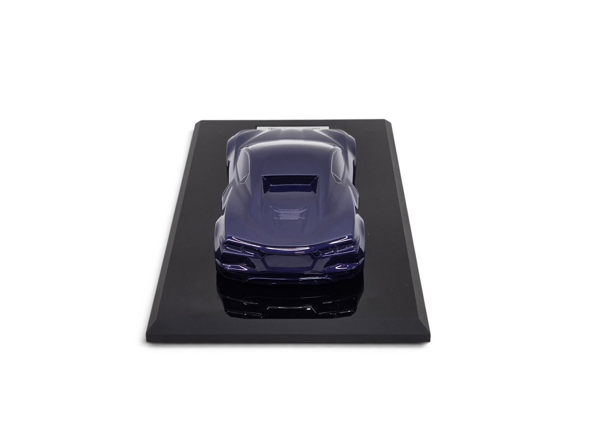 Send it Auto Parts 2025 Corvette C8 Stingray speedshape model in Hysteria Purple on a black display base
