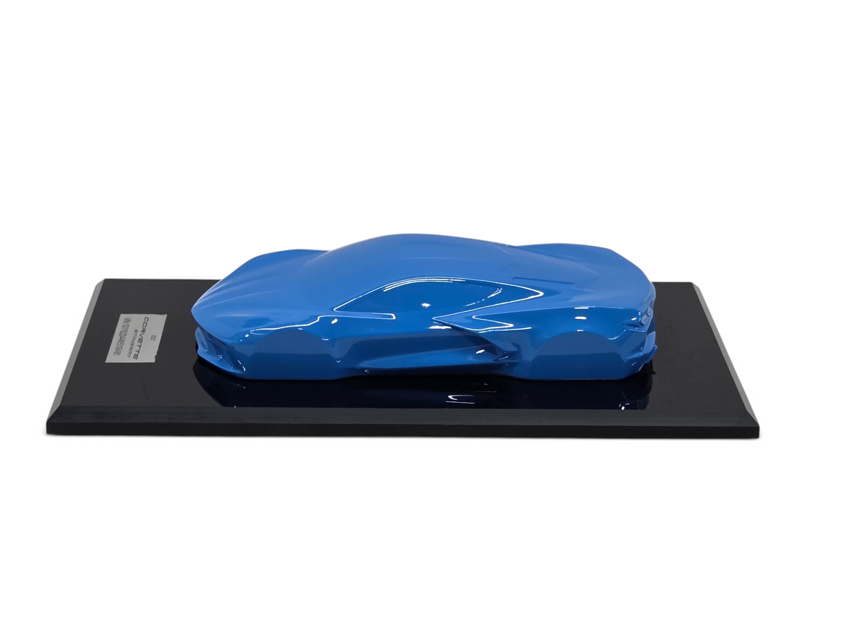 Send it Auto Parts 2022 Corvette C8 Stingray speedshape model in Rapid Blue on a black display base
