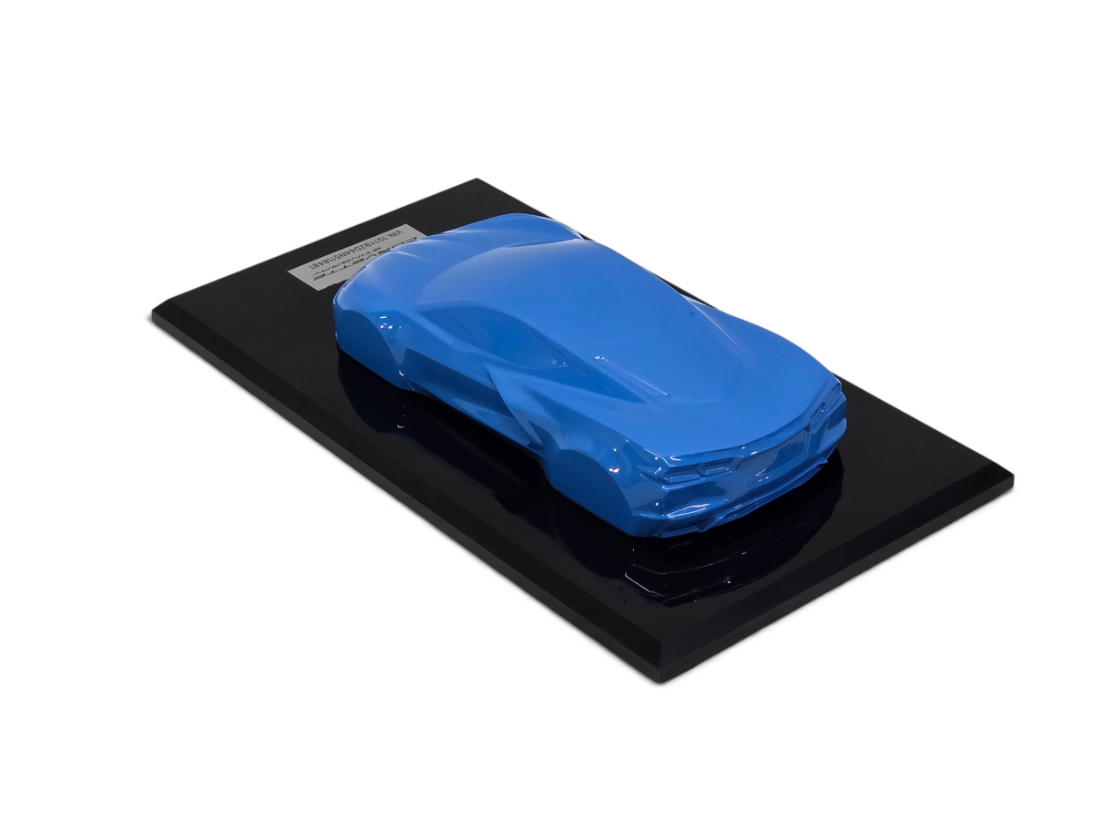 Send it Auto Parts 2022 Corvette C8 Stingray speedshape model in Rapid Blue on a black display base