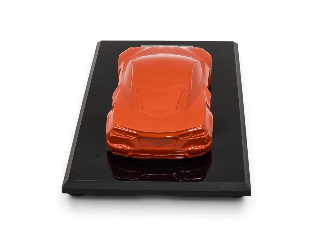 Send it Auto Parts 2020 Corvette C8 Stingray speedshape model in Sebring Orange on a black display base