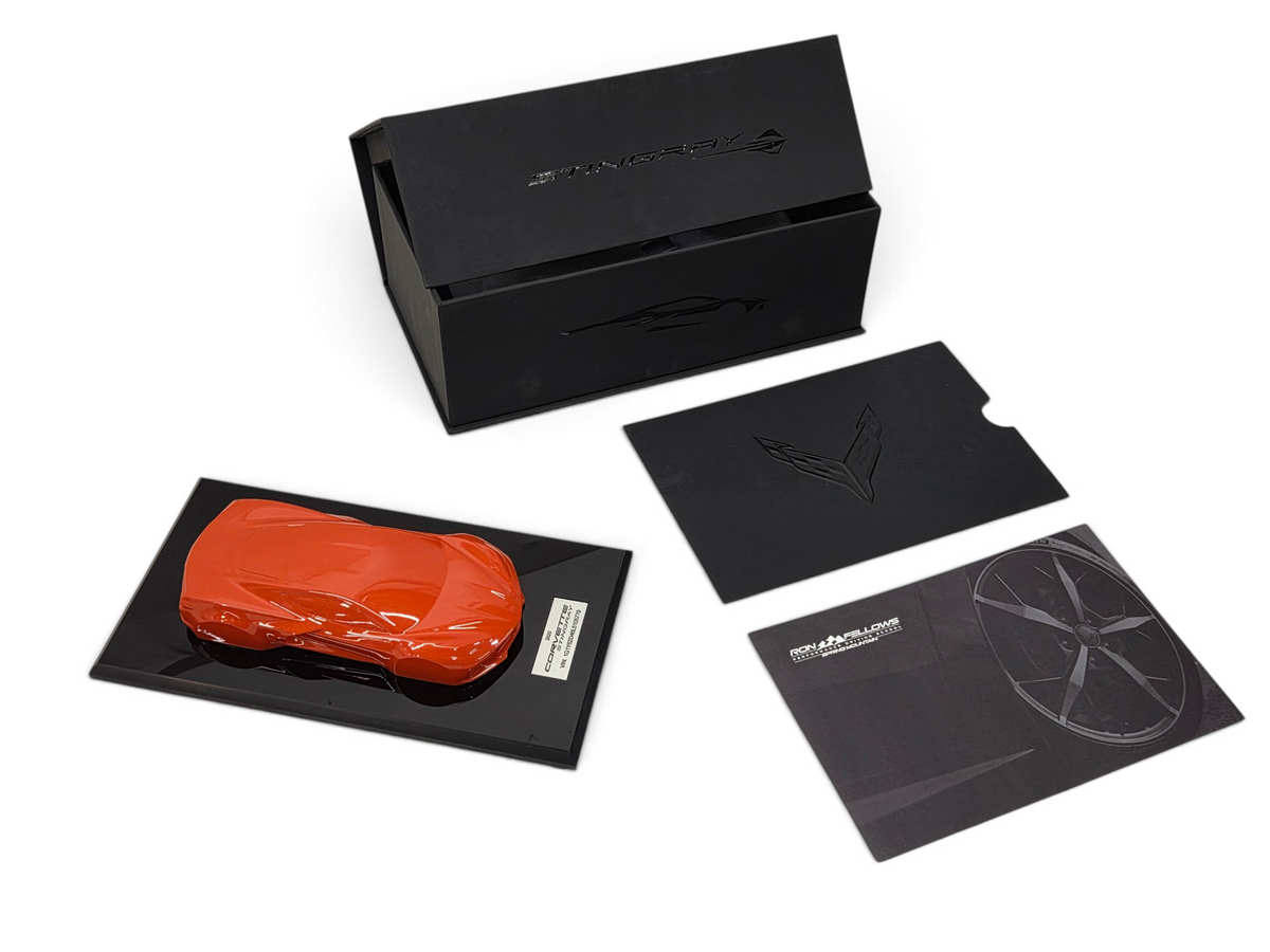 Send it Auto Parts 2020 Corvette C8 Stingray speedshape model in Sebring Orange with display base and packaging.