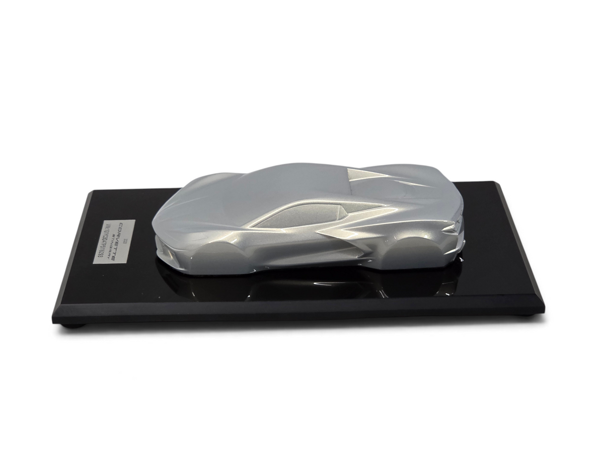 Send it Auto Parts 2023 Corvette C8 Stingray silver flare speedshape model on a black display base