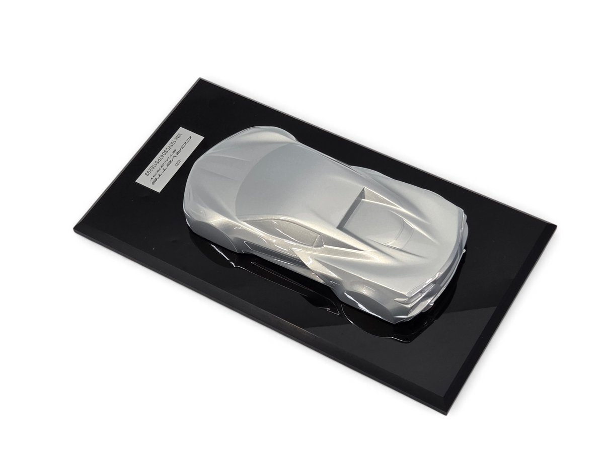 Send it Auto Parts 2023 Corvette C8 Stingray silver flare speedshape model on a black display base