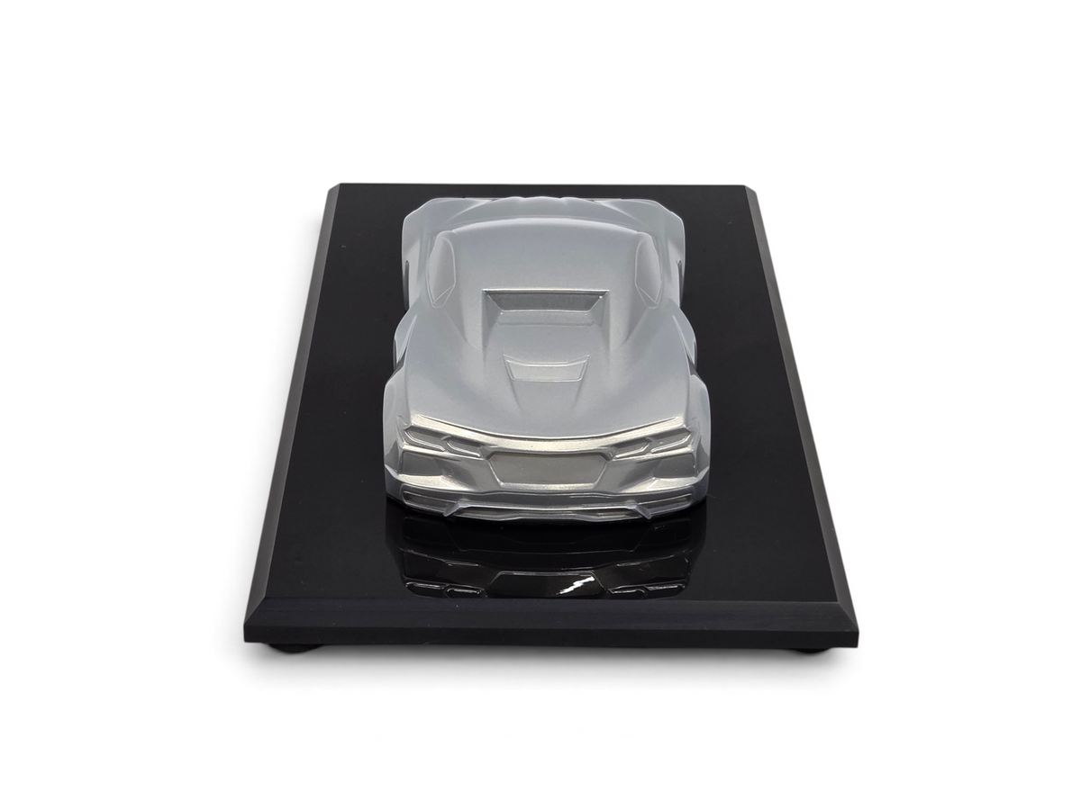 Send it Auto Parts 2023 Corvette C8 Stingray speedshape model in Silver Flare on a black display base