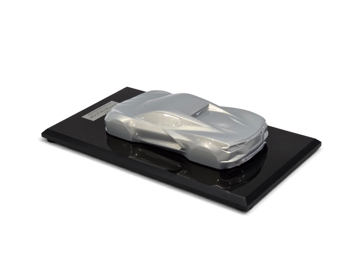 Send it Auto Parts 2023 Corvette C8 Stingray speedshape model in Silver Flare on a black display base