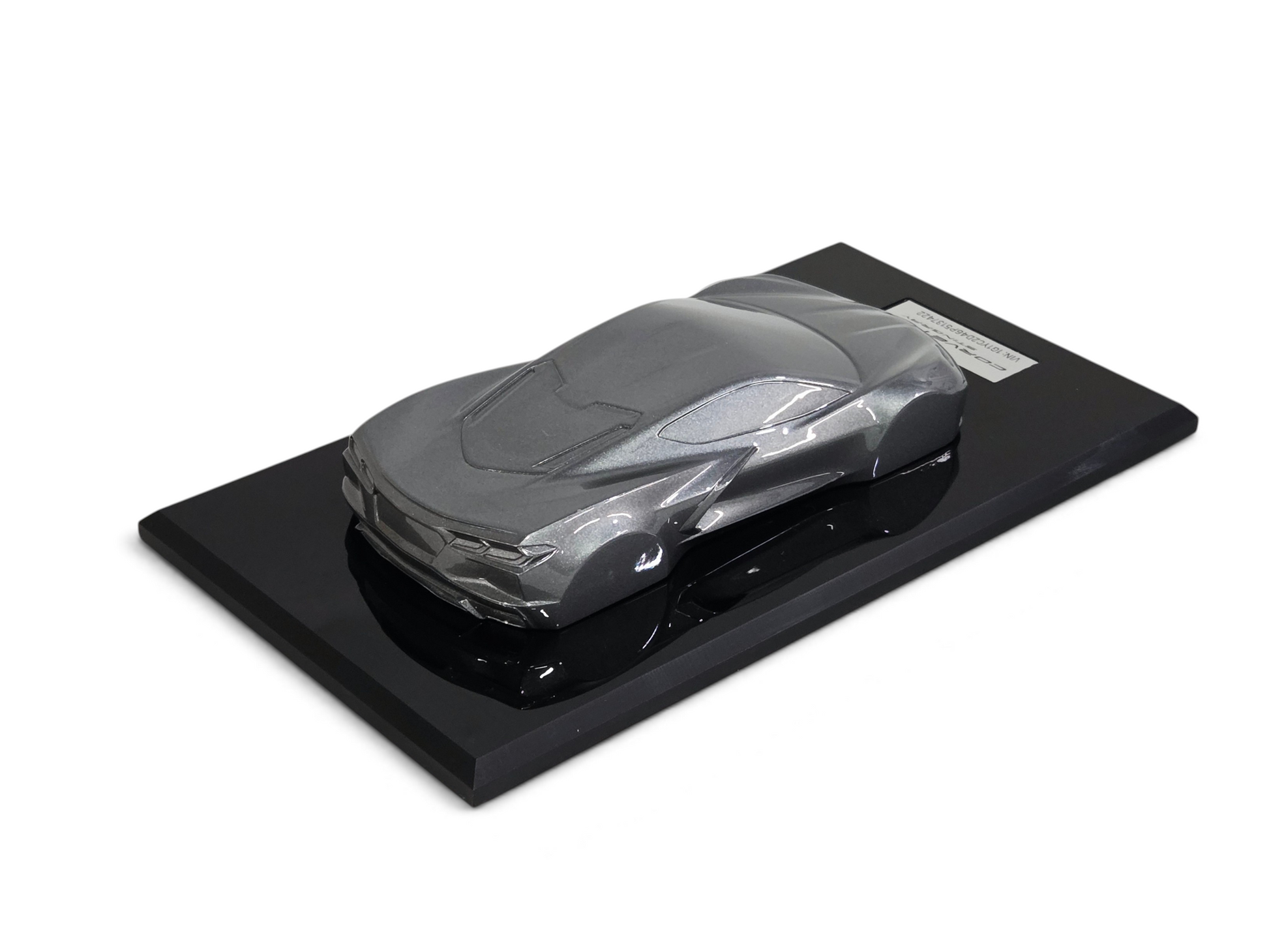 Send it Auto Parts 1:18 scale 2023 Corvette C8 speedshape model in Hypersonic Gray on a black display base.