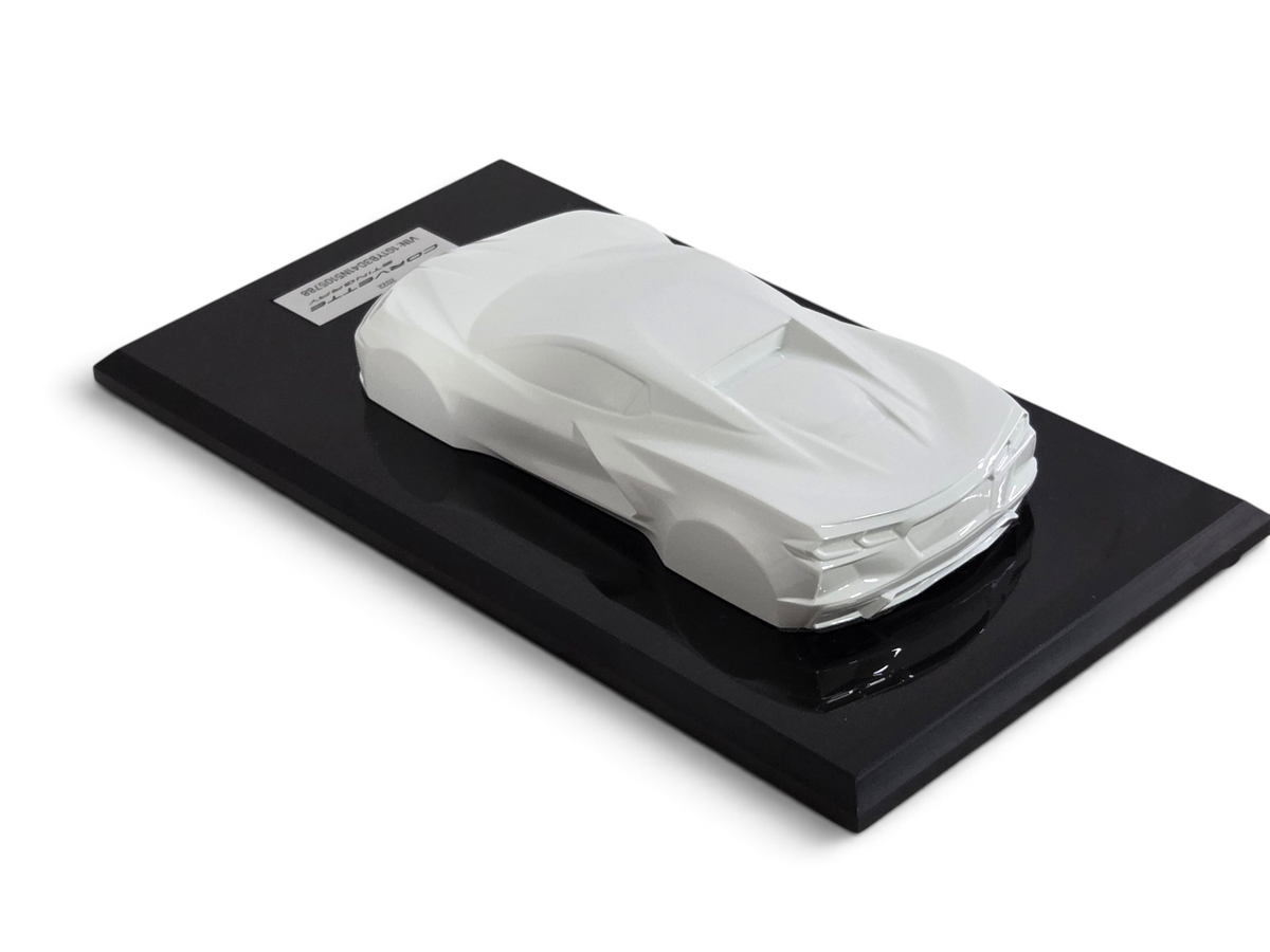 Send it Auto Parts 2022 Corvette C8 Stingray Arctic White 1:18 scale speedshape model on a black display base